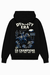 Black heavyweight hoodie with cream “DYNASTY ERA” and blue cowboy riding graphic, 5X Champions helmet artwork – Sunday Club Dallas collection
